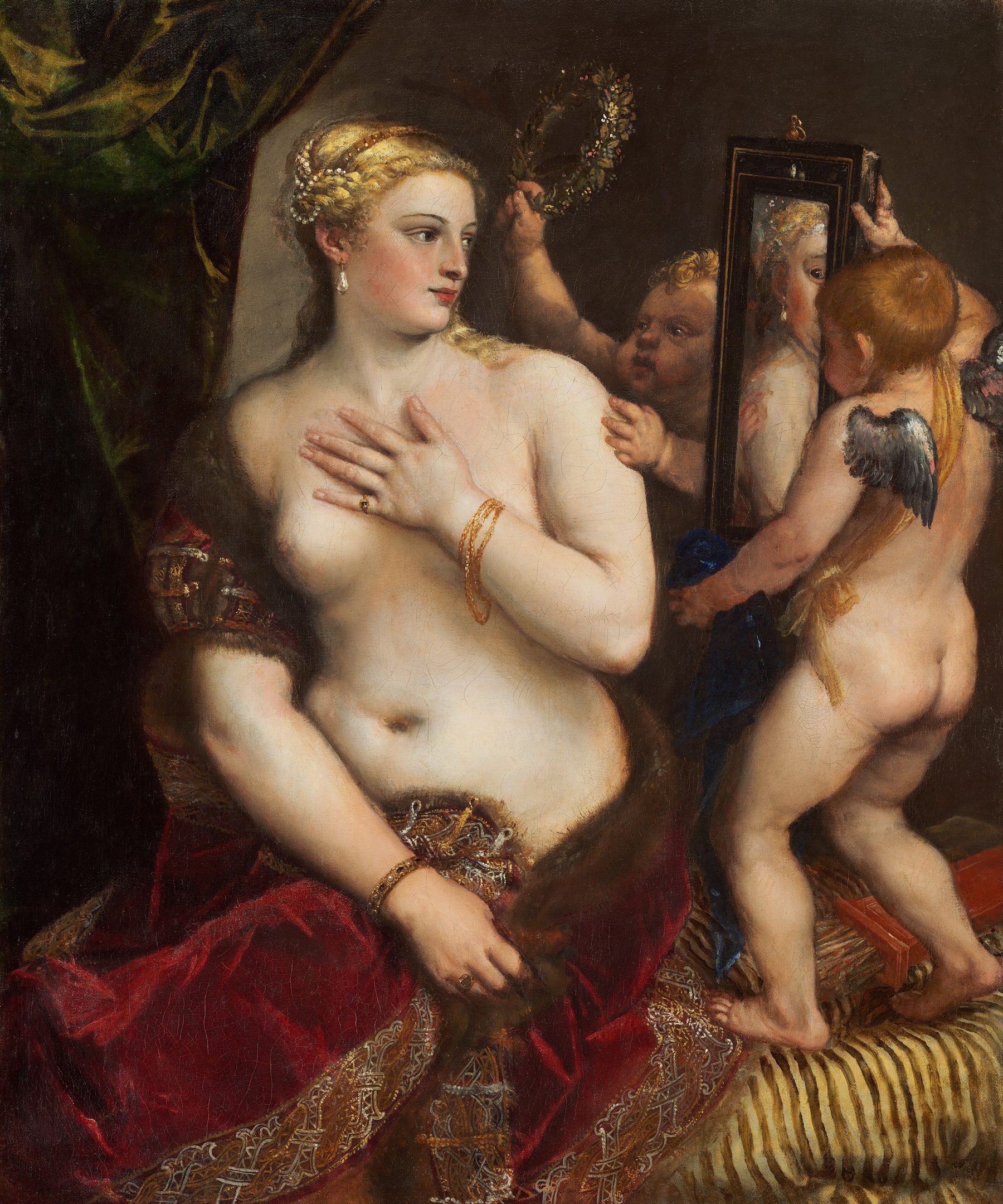 Vénus se regarde dans un miroir tenu par deux amours — Titien.